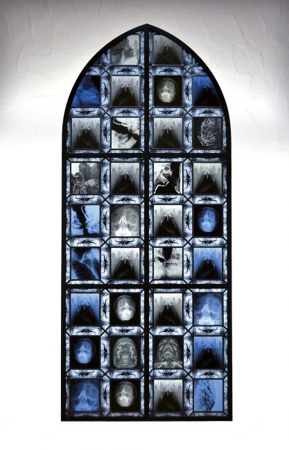 Wim Delvoye, Euterpe, stained glass with radiographies of couples making love, steel, X-rays, glass, lead, 200 X 80 cm.